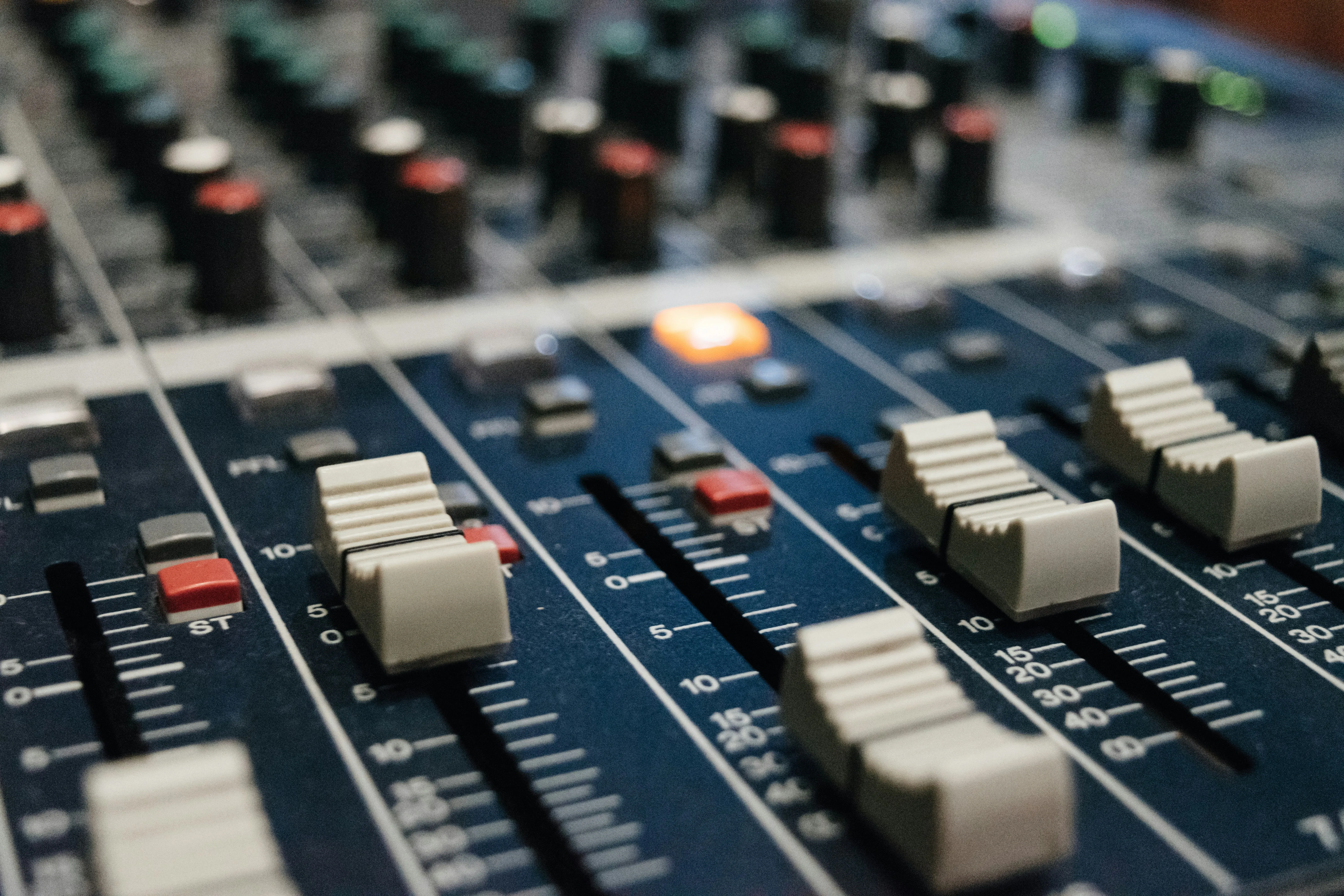 Close-up of a mixing board.